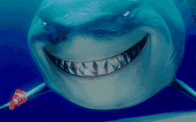 http://www.totalprosports.com/wp-content/uploads/2013/08/nemo-shark-smiling-shark-gifs.gif