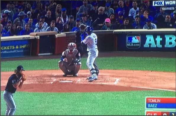 guy in pink hat at wrigley field