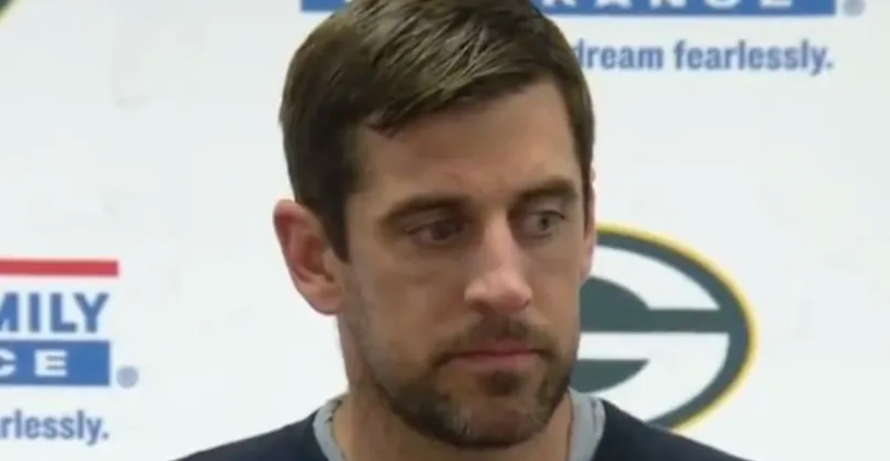 Aaron Rodgers looked gutted in a brief postgame handshake with Tom