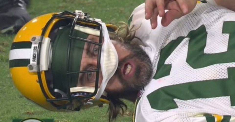 Social Media Hilariously Roasted Aaron Rodgers Having His Chinstrap Around His Nose After Big Hit [VIDEO + TWEETS)