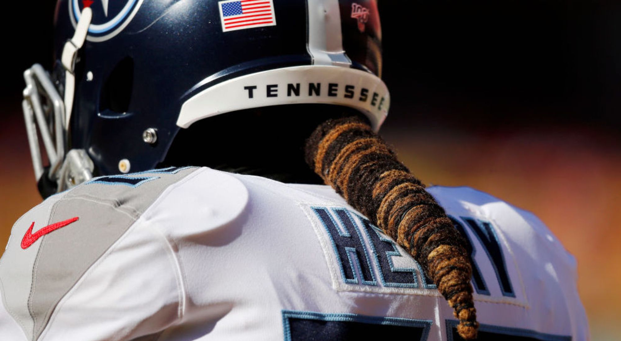 Close up shot of Derrick Henry hair in a Tennessee Titans helmet.