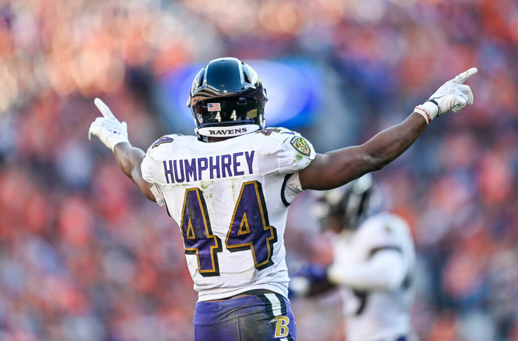 Baltimore Ravens cornerback Marlon Humphrey (44) warms up before