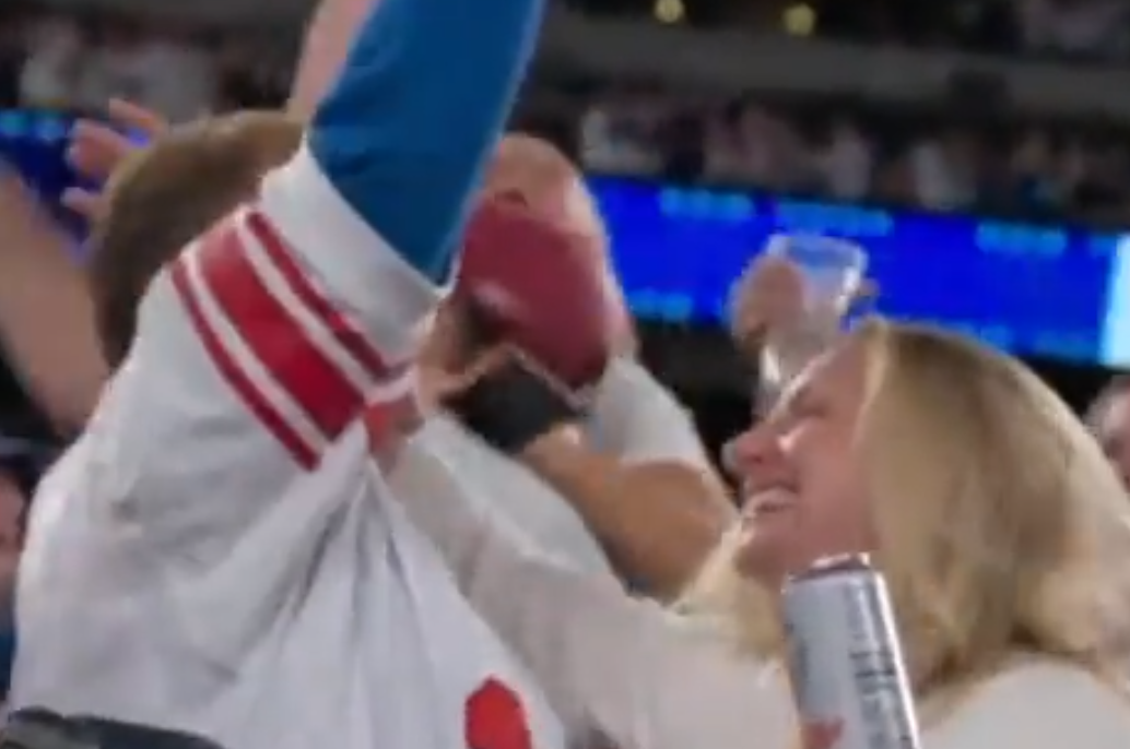 Giants fan savagely turned down for a kiss after trying to