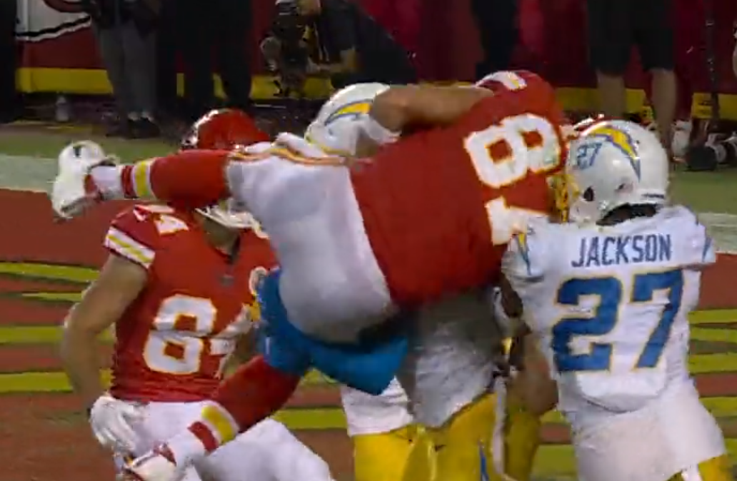 Derwin James WWE BODY SLAM on Travis Kelce 