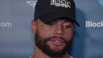 Dak Prescott Looks On While Answering Questions from reporters