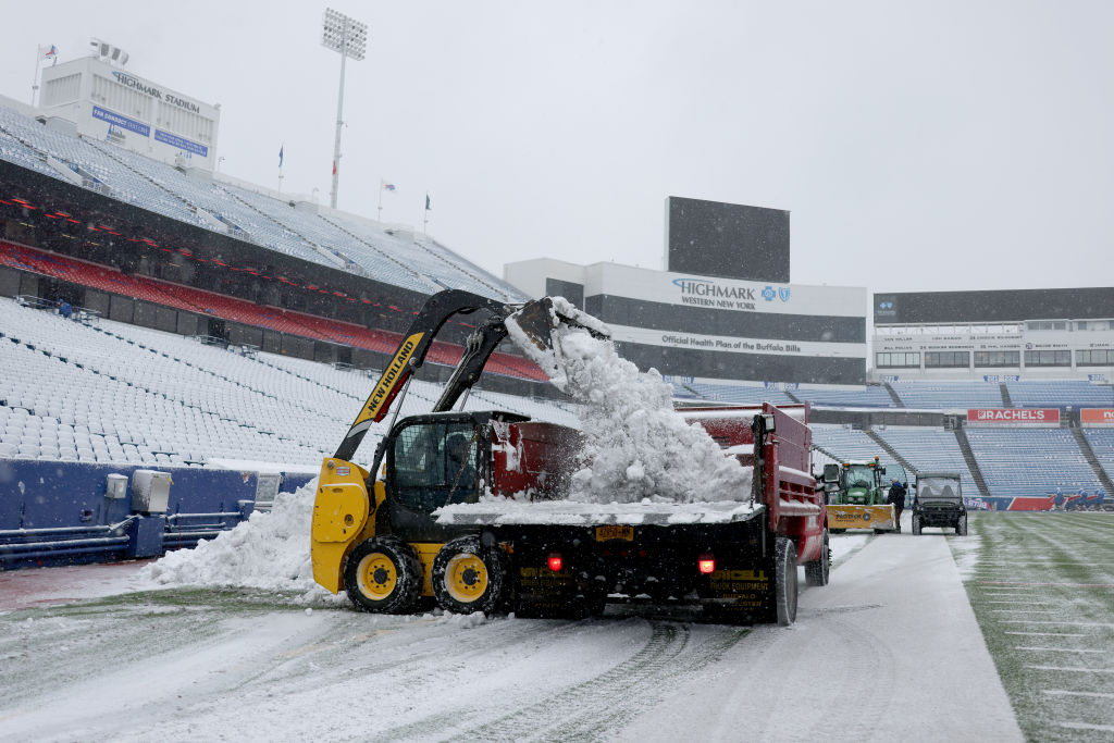 snow being picked up in stadium