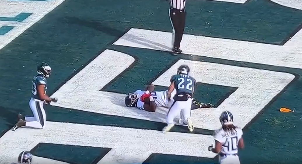 Titans' Treylon Burks takes brutal hit to facemask, somehow maintains  touchdown catch