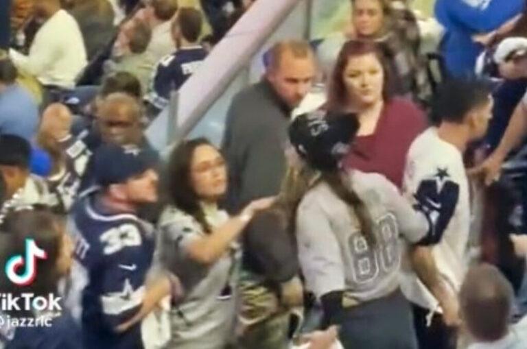 Female Cowboys Fan Spat In The Face of Another Fellow Fan