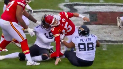 Patrick Mahomes gets his right ankle rolled on in a game, injuring him