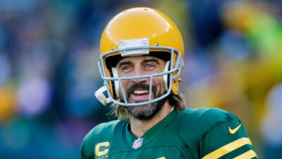 Aaron Rodgers in uniform and smiling