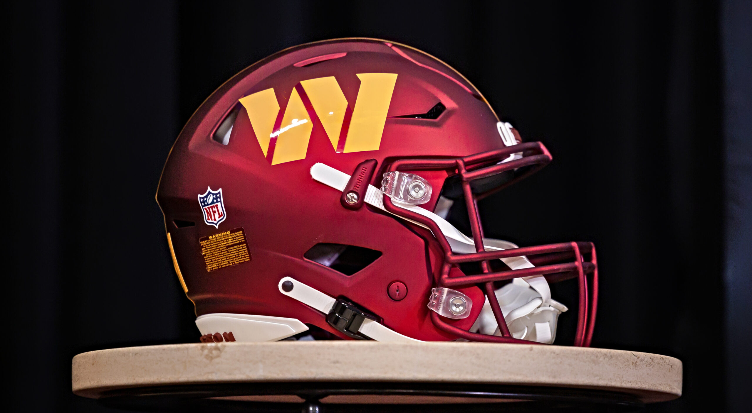 A view of a Washington Commanders helmet on display during a press News  Photo - Getty Images