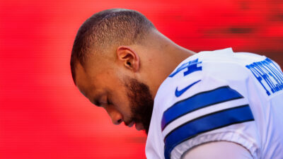 Dak Prescott in uniform with his head down