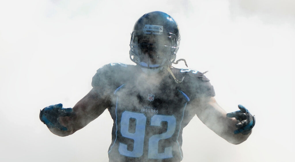 Austen Lane in Jags uniform coming out in smoke