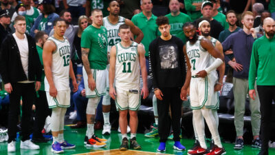 Boston Celtics players on the sideline