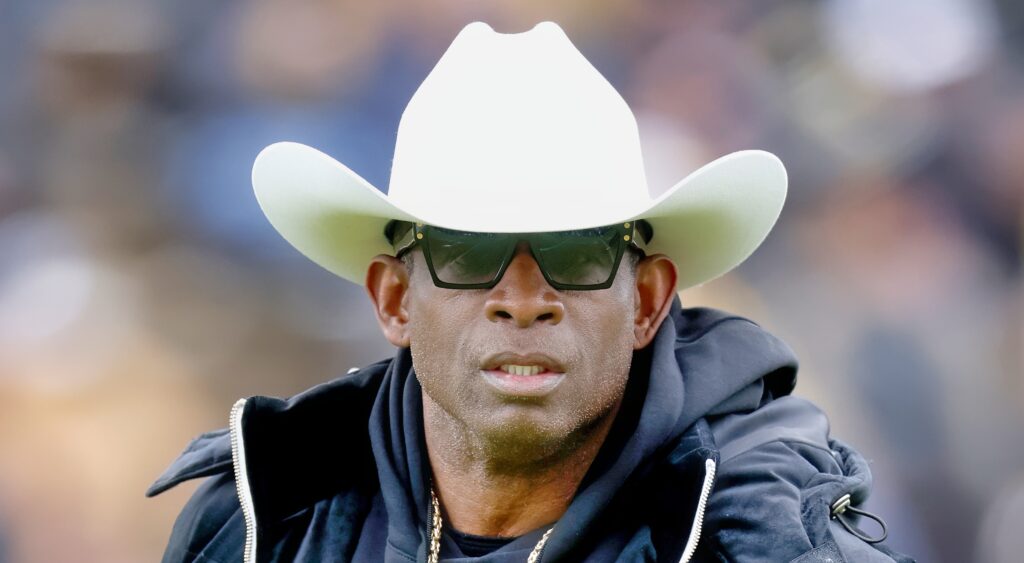 Deion Sanders looking on during warmups for 2023 game.