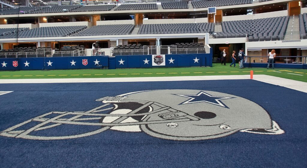 Cowboys helmet logo on ground