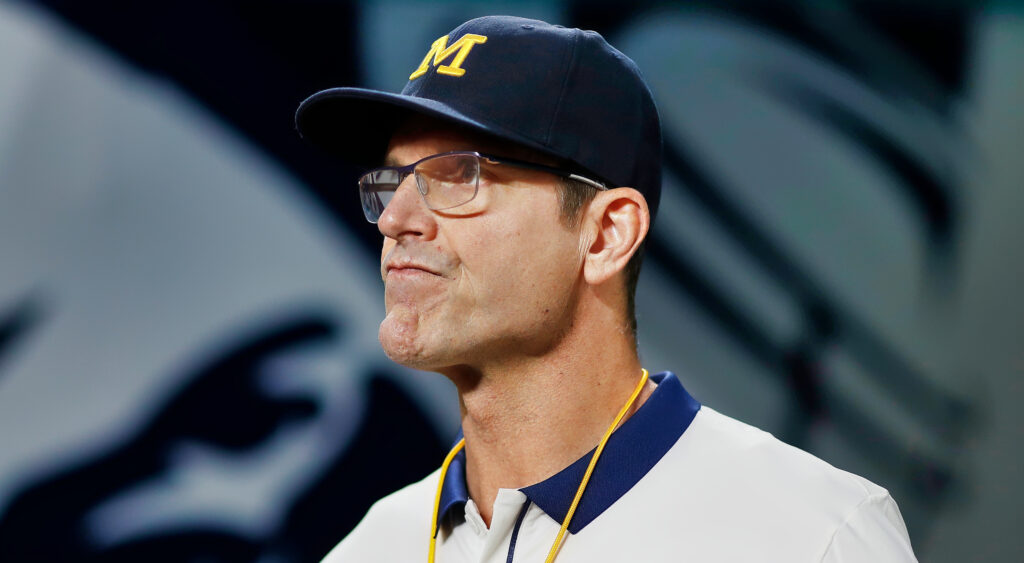 Jim Harbaugh wearing Michigan cap