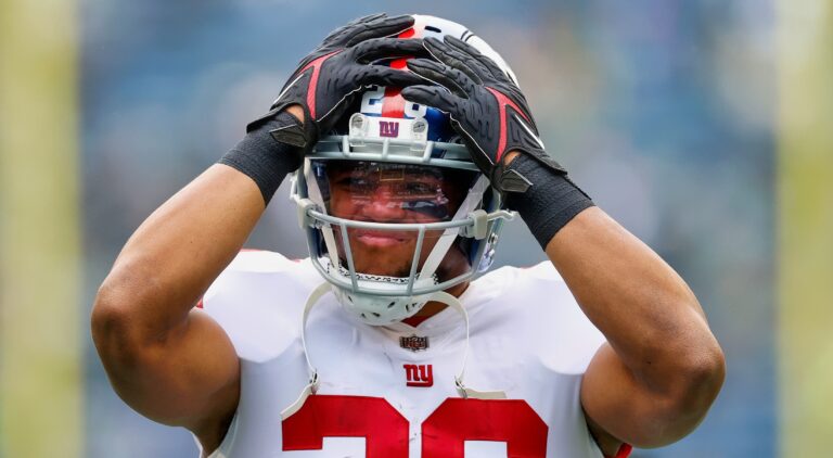 Saquon Barkley with hands on head