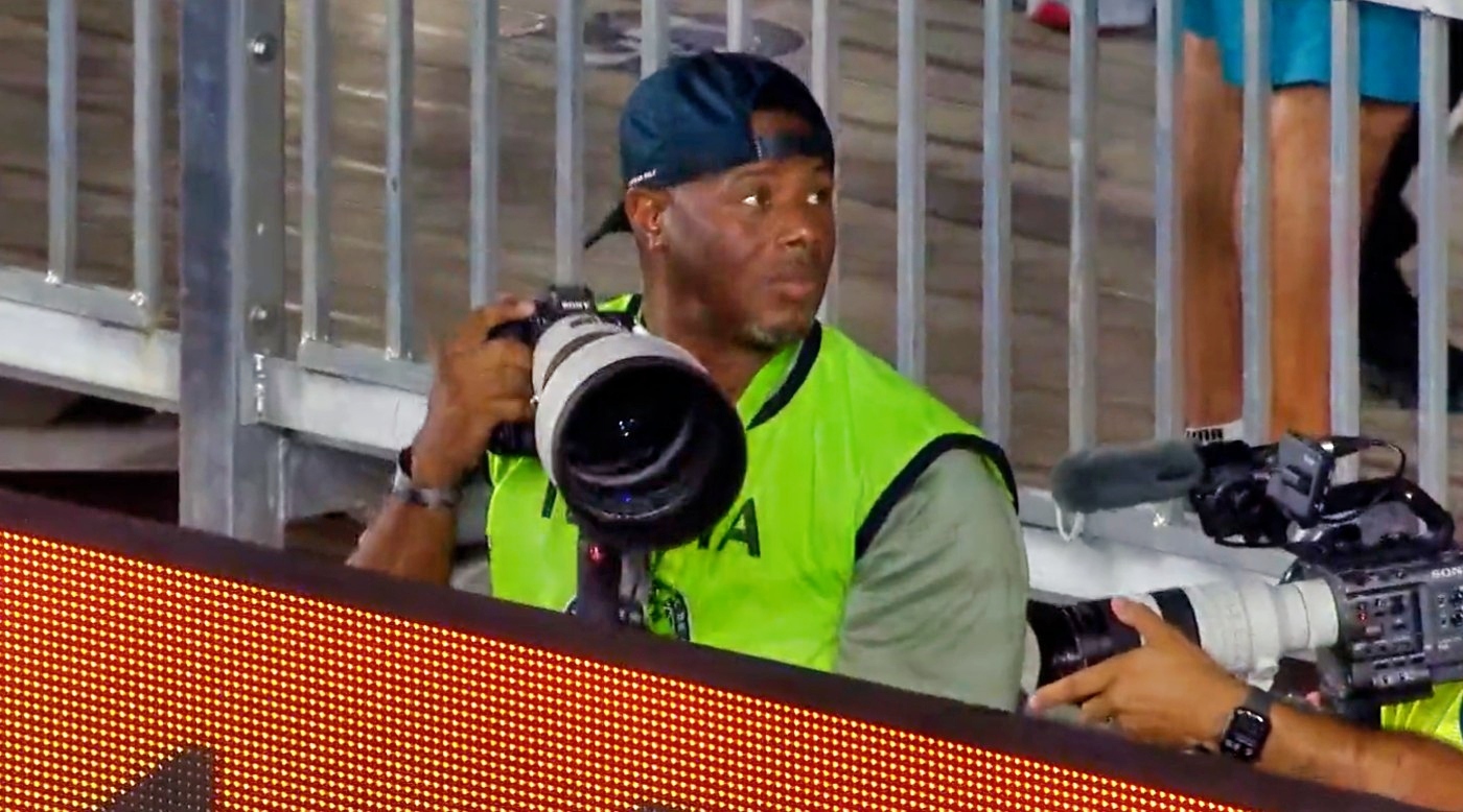 Ken Griffey Jr. Is a photographer at the Arizona Cardinals game