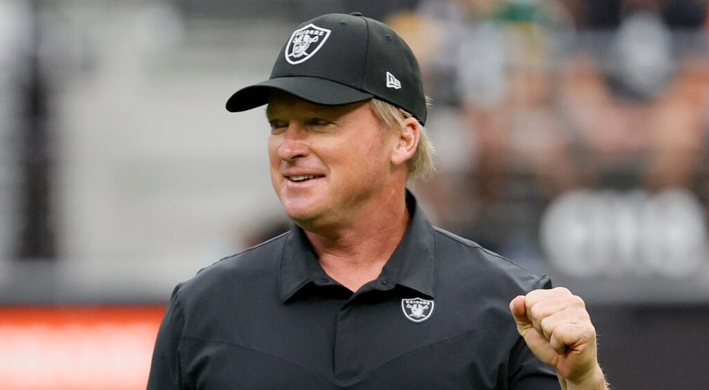 Las Vegas Raiders' head coach Jon Gruden smiling beforegame.