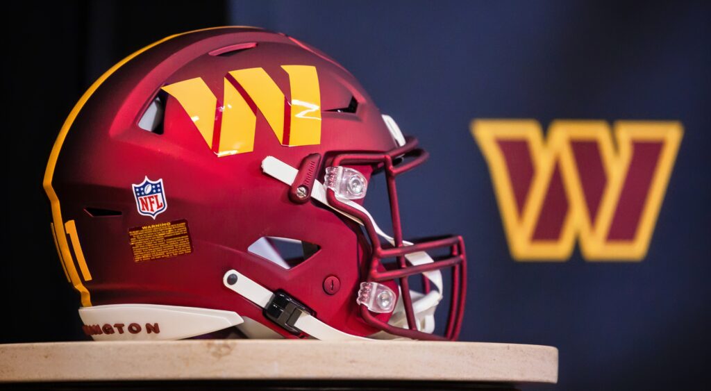 Washington Commanders' helmet shown at conference.