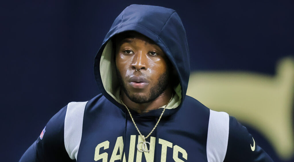 Alvin Kamara with hoodie on.