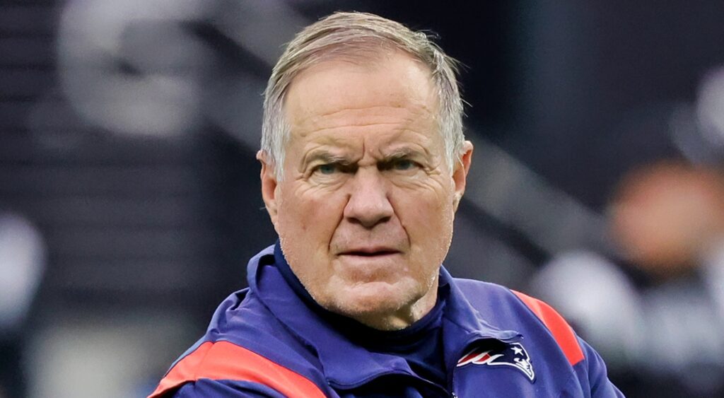 New England Patriots' head coach Bill Belichick looking on.