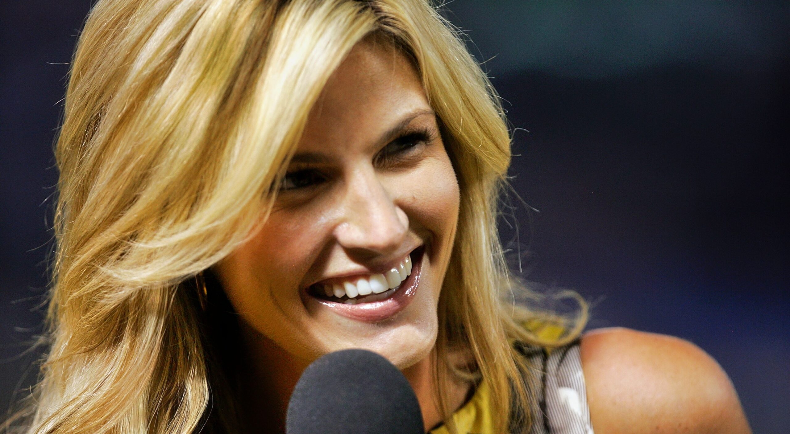 ARLINGTON, TX - DECEMBER 24: FOX sideline reporter Erin Andrews interviews Dallas  Cowboys linebacker