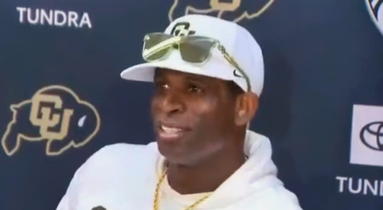 Deion Sanders smiling