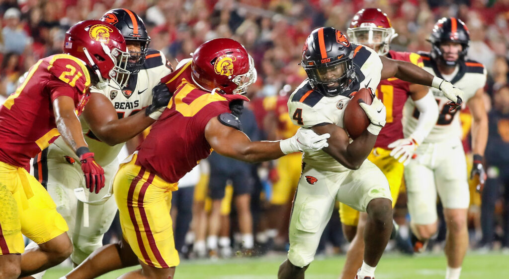 B.J Baylor running against USC defense