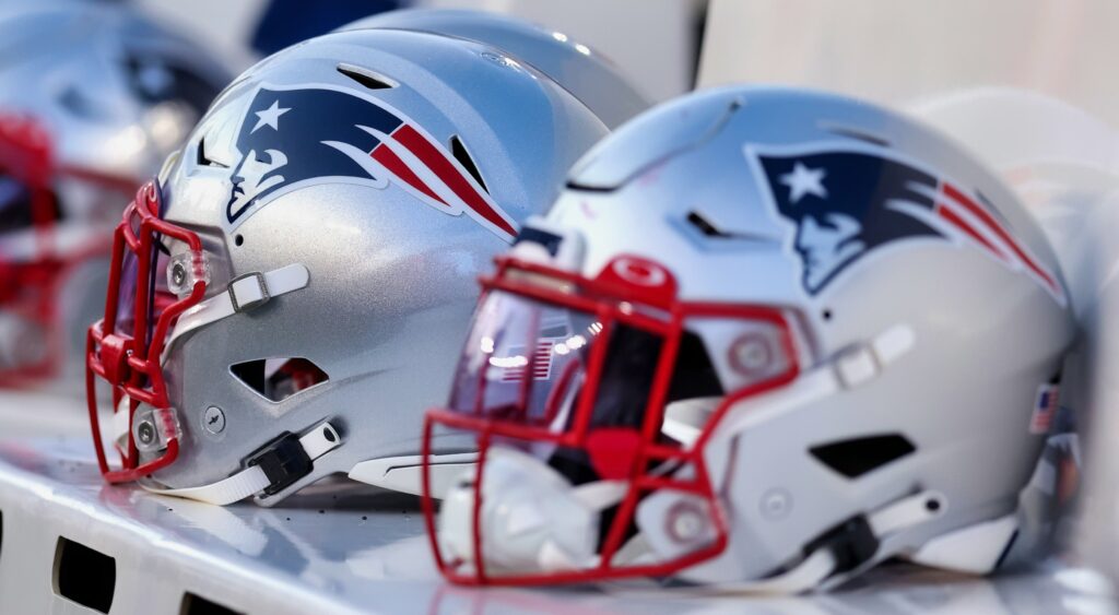 Patriots helmets on the bench.