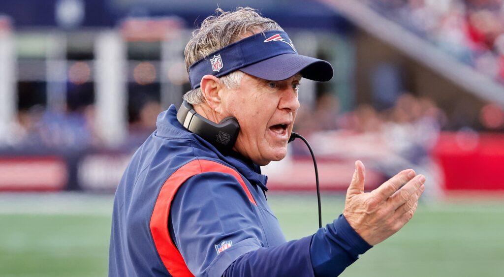 Bill Belichick in Patriots gear and headset