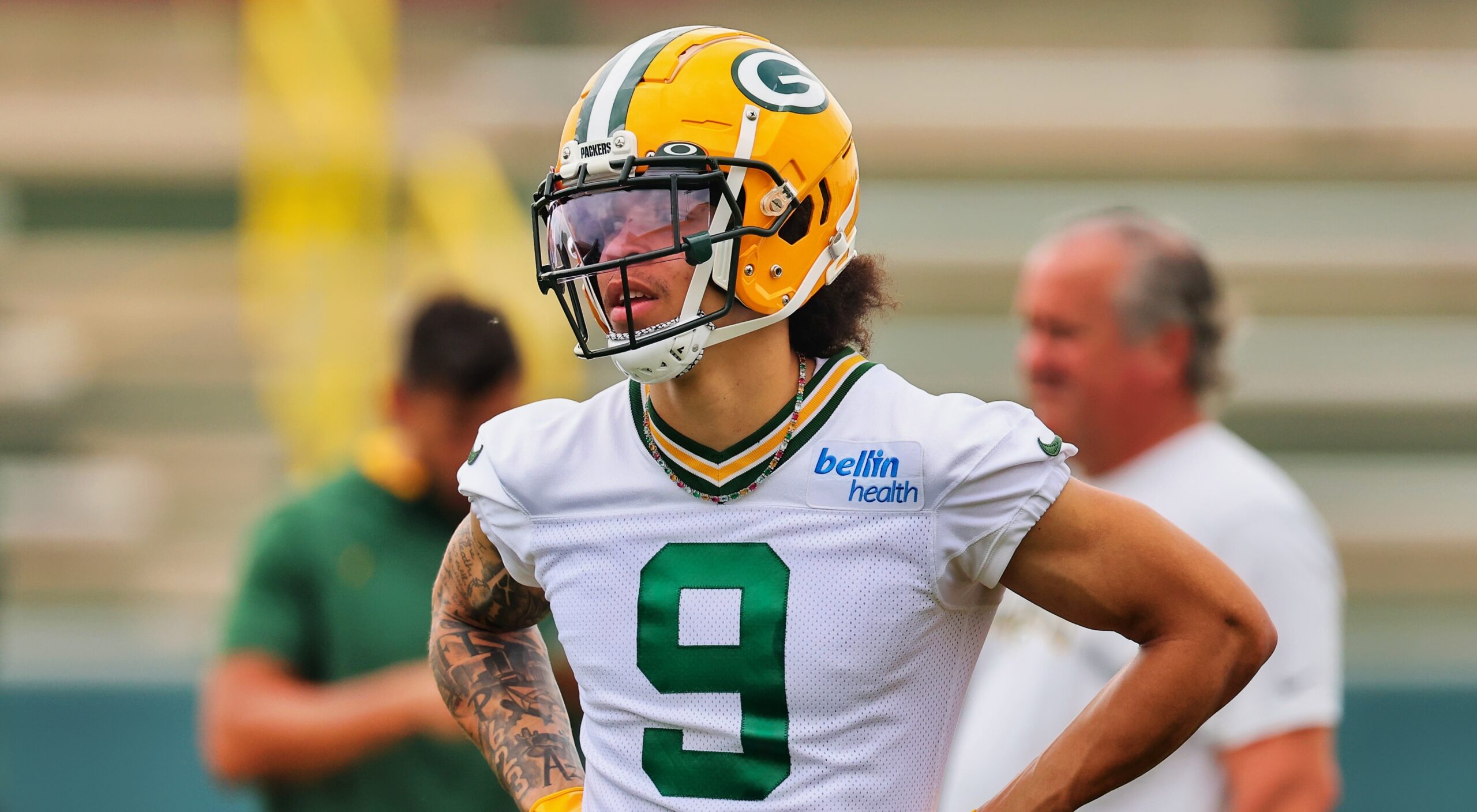 Christian Watson of the Green Bay Packers warms up before the News Photo  - Getty Images