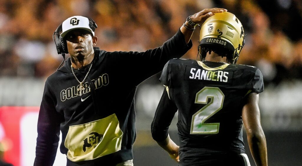 Deion Sanders (left) celebrating with son Shedeur Sanders (right).