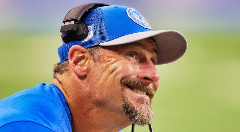 Dan Campbell smiling during game.