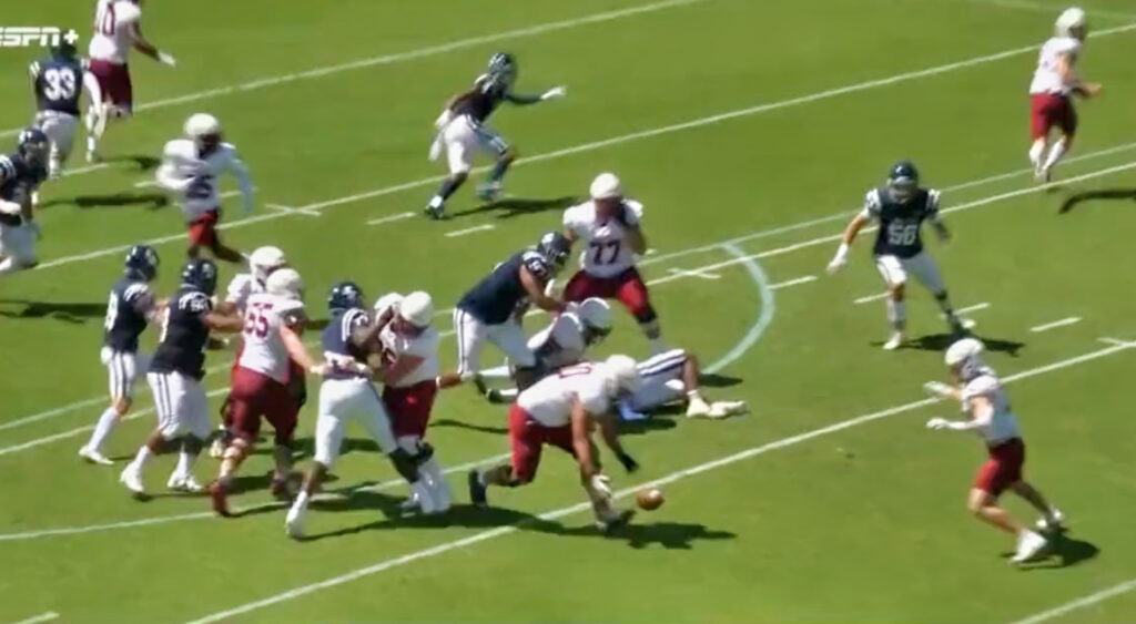 Colorado offensive lineman Cooper Mumford throwing touchdown pass.