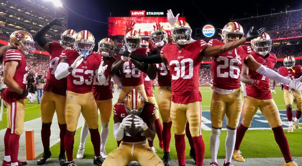 San Francisco 49ers celebrating a touchdown.