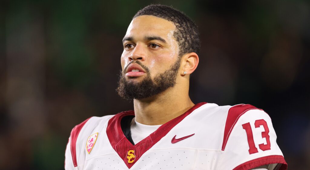 Caleb Williams looks on without his helmet during a game.