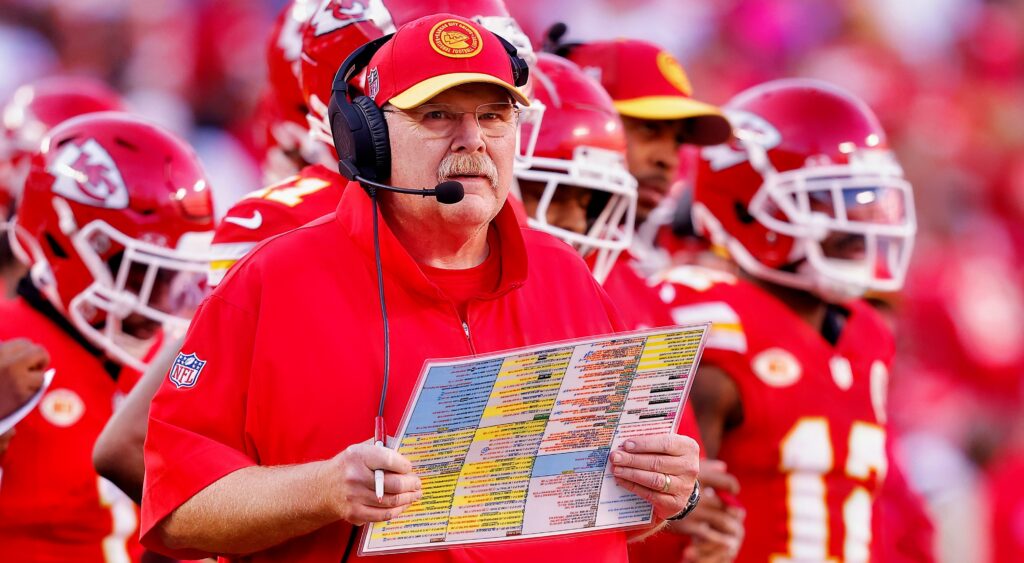 Andy Reid holding play-sheet on sidelines