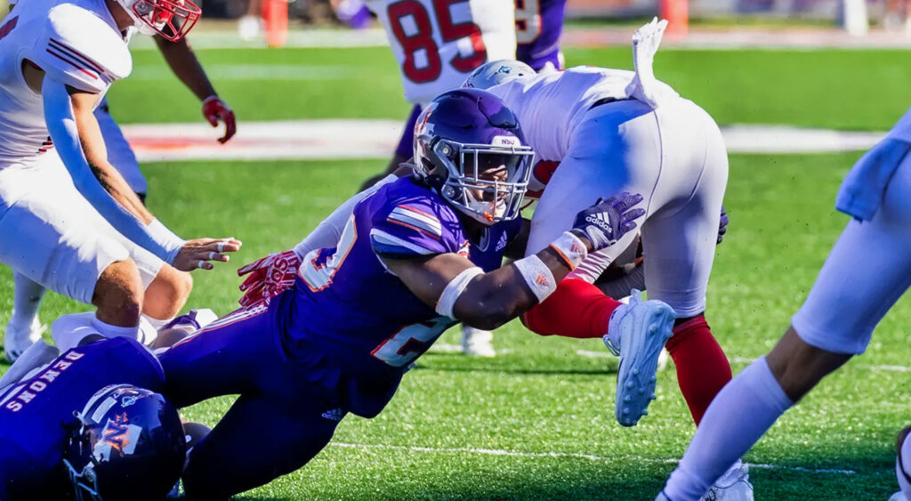 Ronnie Caldwell making a tackle