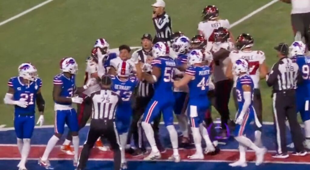 Bills Bucs players in scrum