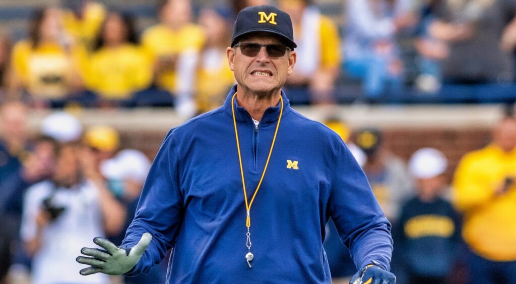 Jim Harbaugh coaching during a game.