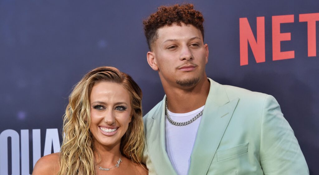 Patrick and brittany Mahomes posing