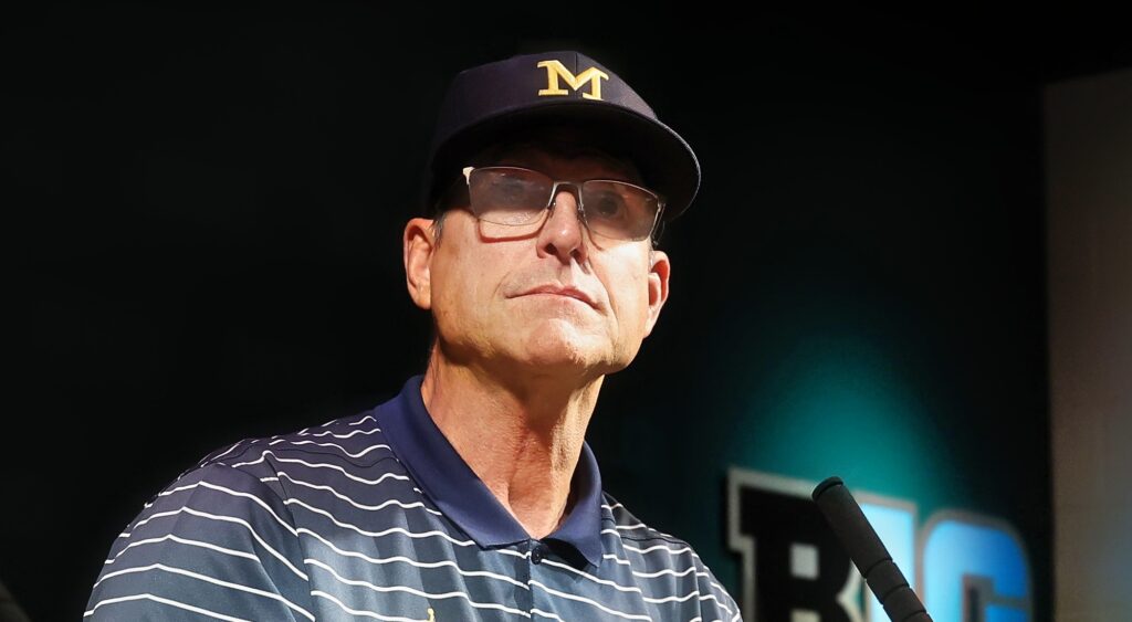 Jim Harbaugh of Michigan Wolverines talking to media.