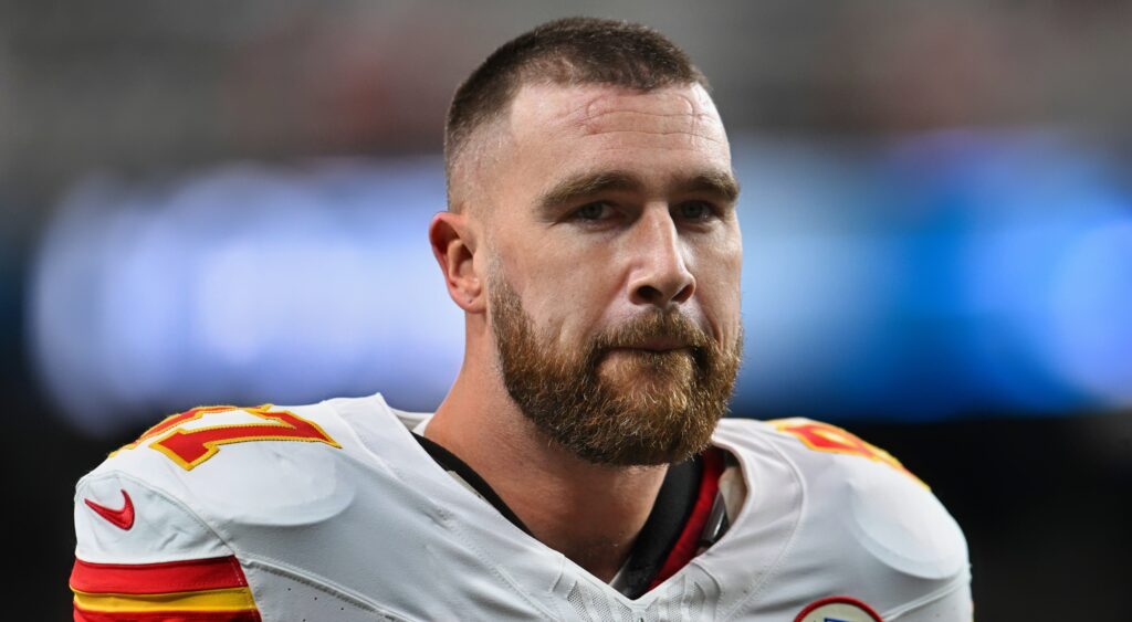 Travis Kelce biting his lip