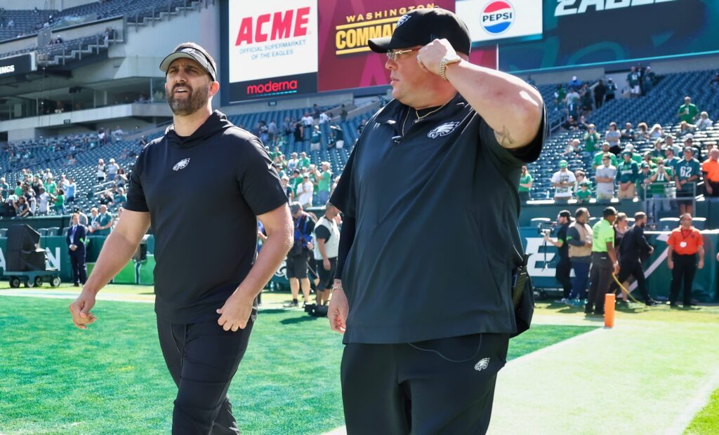 Big Dom walks onto the field with Nick Sirianni.