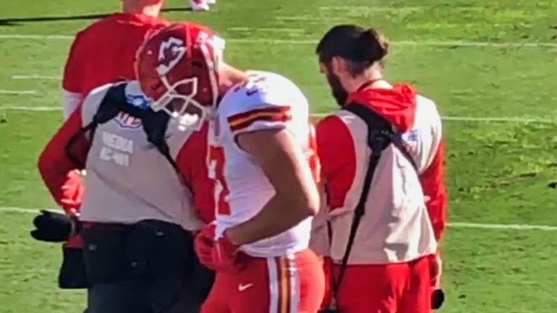 Travis Kelce of Kansas City Chiefs looking on at game.