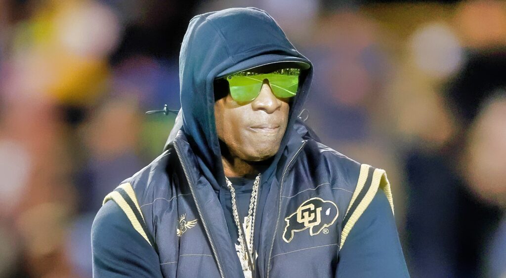 Deion Sanders of Colorado Buffaloes looking on.