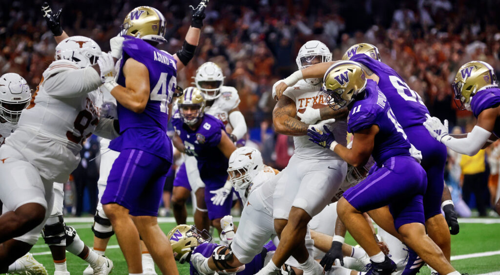 Longhorns player rushing for touchdown