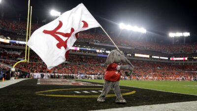 Alabama mascot with flag